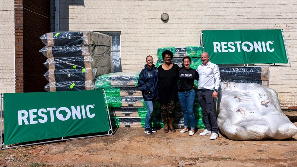 Restonic and Bismot staff in a photo